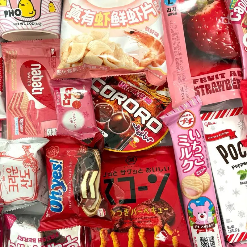 697b5e20579c43558cad2aeb49f3eea1_tplv-fhlh96nyum-resize-webp_800_800.jpg Deluxe Pink Theme Asian Snack Box Includes 2 Drinks 2 Ramen Sweet Asian Snacks Box Gift Large Size 45-50 Pcs Variety of Treats - Image 1