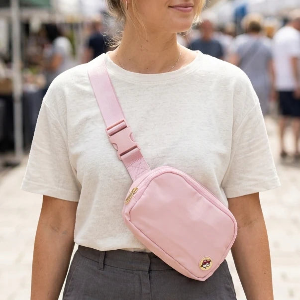 Buc-ee_s_Pink_Crossbody_Bag-1.jpg Buc-ee’s Pink Crossbody Belt Bag, Adjustable Fanny Pack & Waist Bag with Zipper Pockets, Small Travel & Everyday Bag - Image 1